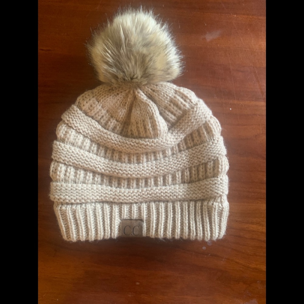 Cream cc hat with Pom Pom